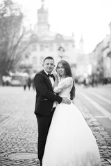 Bride and bridegroom with bouquet