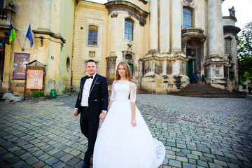 Bride and bridegroom with bouquet