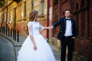 Bride and bridegroom with bouquet