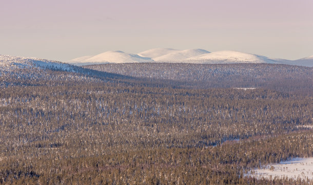 winter landscape with mountains in Lapland, Finland