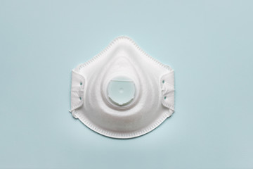 [Protection medical] White medical mask isolated. Face mask protection against pollution, virus, flu and coronavirus isolated on a Light pink background.