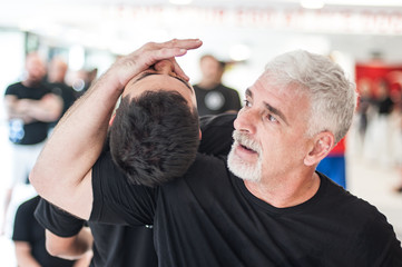 Kapap krav-maga and martial arts instructor demonstrates street fighting techniques
