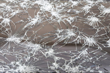 Closeup of Modern smart phone with broken screen. Select focus