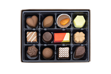 Box of chocolate candies set for Valentine's Day or as a surprise gift isolated on white background. Clipping path