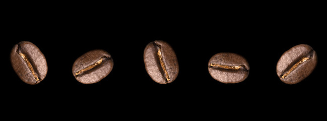 Shiny premium roasted coffee bean on black background, macro photo