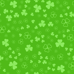 Seamless pattern with green clover leaves. Modern background with repeating elements for packaging, printing, fabric. Vector