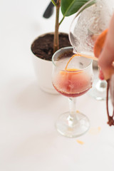 White background, wine glasses and black, strong, morning, fresh coffee in glass container for alternative method preparation.