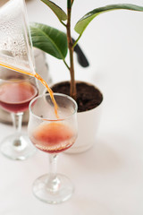 White background, wine glasses and black, strong, morning, fresh coffee in glass container for alternative method preparation.