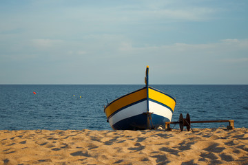 Boat staying on seashore beach