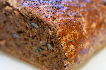 Close up of sliced inside of seeded freshly baked wholemeal bread