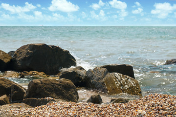 Sea coast and sky, wet stones, waves. Background