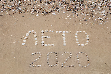 Ocean coast, beach. The inscription 