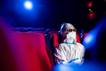 sick person cinema mask watch movie public virus