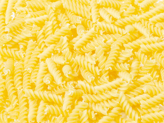 background of yellow italian pasta. healthy lifestyle concept
