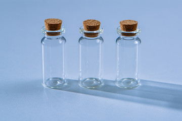 three empty beakers or test tubes