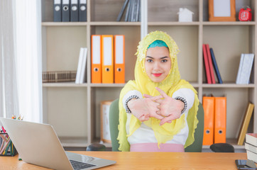 Happiness young business arab middle eastern muslim woman relaxing at comfortable office chair, Work from  home concepts