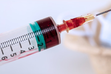 needle filled with red substance