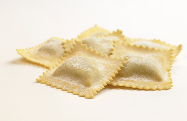 Group of ravioli, stuffed pasta, isolated on a white background