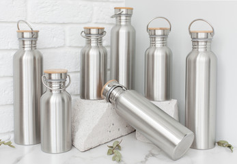 Metal bottles for water, without plastic. Reusable bottle for travel, sports, walking and recreation. Planet safety