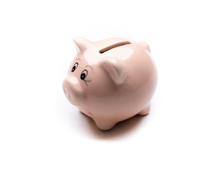 Pink piggy bank isolated on a white background.