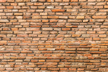 Old brick wall background, outdoor daylight, ancient red brick wall texture background
