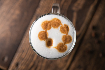 Tasty cappuccino late in a glass