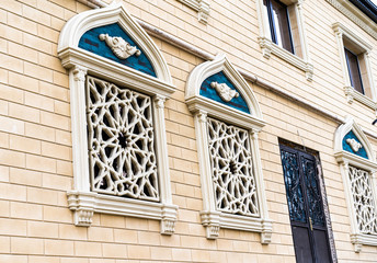 The windows of the building are arabic