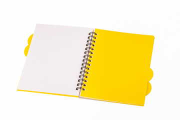 Notebook white with yellow insert pages, on iron weaves