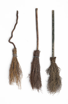 old wooden broomstick isolated on white background,Set of  different magical  brooms.