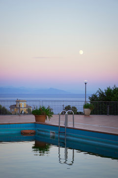 Empty swimming pool at sunset in Varazze, Italy