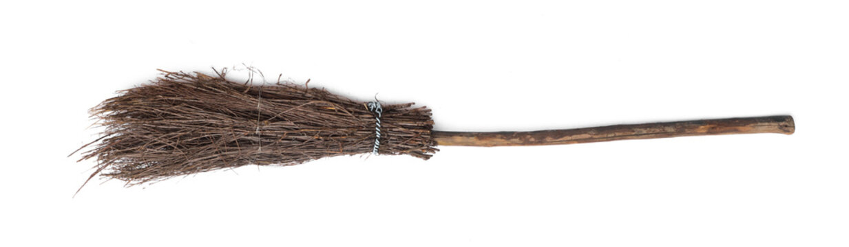 old wooden broom isolated on white background