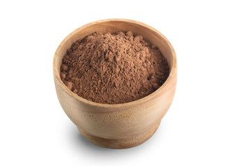 Cacao. Pile of cocoa powder in wooden bowl isolated on the white background view from above