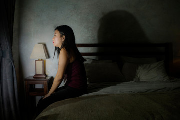 young scared and depressed Asian Chinese woman suffering anxiety disorder and depression problem...