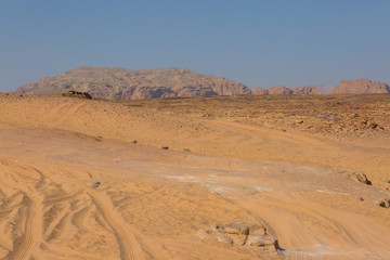 Fototapeta na wymiar Coloured Canyon is a rock formation on South Sinai (Egypt) peninsula. Desert rocks of multicolored sandstone background.
