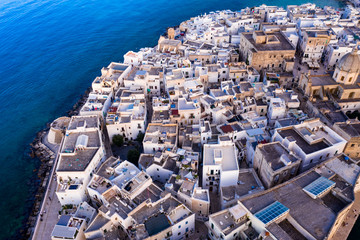 Naklejka premium Aerial view, from the old town of Monopoli, at dusk, Puglia, Italy,