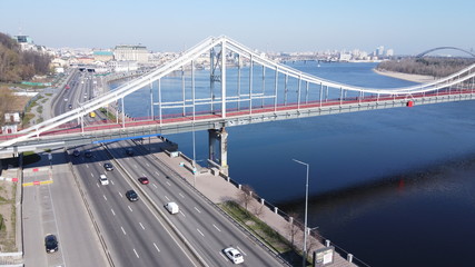 Obraz premium Kiev, Ukraine. River Dnipro. Pedestrian bridge. Aerial photo.