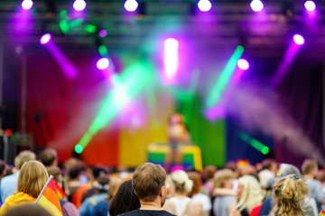 Fototapeta na wymiar Music Event on PRIDE Festival with colourful flags and spotlights, LGBT