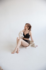 girl in underwear tenderness in a white shirt
