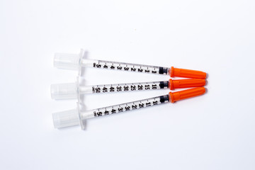 syringe over white background