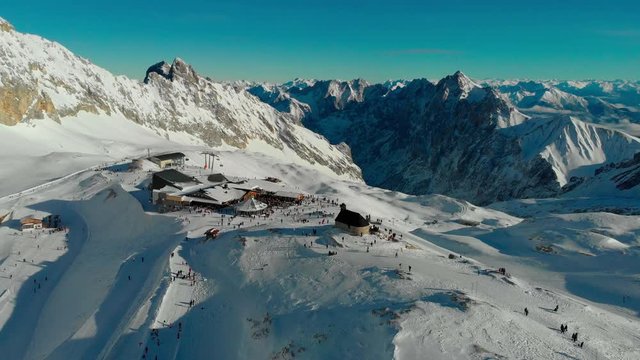 The lower part of the ski resort Zugspitze as seen from the Zugspitzplatt, central hub for all skiing lifts and the Zugspitz train glacier station. Drone view