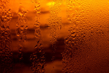 Texture of water drops on the bottle of beer,Macro beer surface