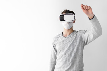 virtual school, a young man during the coronavirus is engaged in an online school. The concept of learning during quarantine.