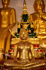 Fototapeta na wymiar Golden Buddha statue, Thailand