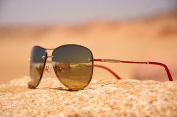 sun glasses on the beach