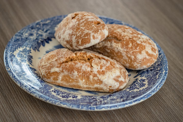 Gingerbread on the plate on the table