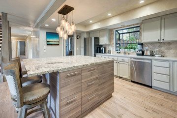 Luxury home dining room and kitchen interior with natural rustic modern deisgn.