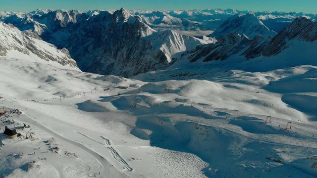 The lower part of the ski resort Zugspitze as seen from the Zugspitzplatt, central hub for all skiing lifts and the Zugspitz train glacier station. Drone view