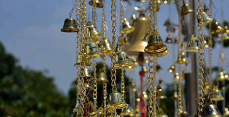 Golden bell decorated with Thai temples