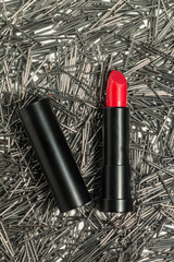 red lipstick on nails background