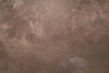 Brown artistic canvas backdrop with stains. Abstract vintage texture.